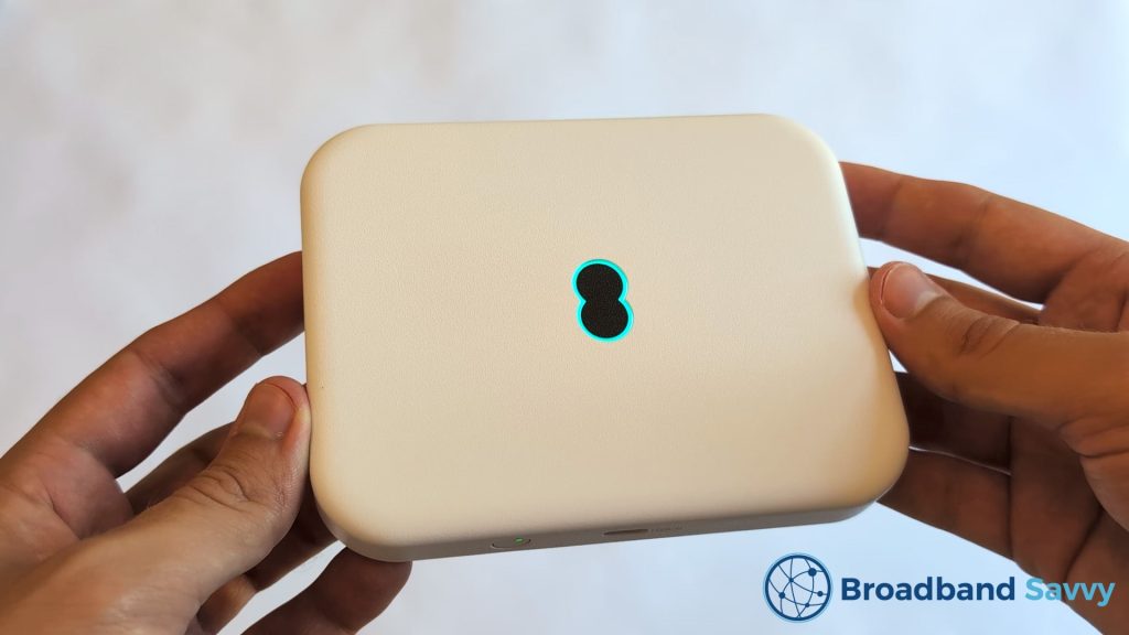 EE 5G MiFi device status light illuminated turquoise.