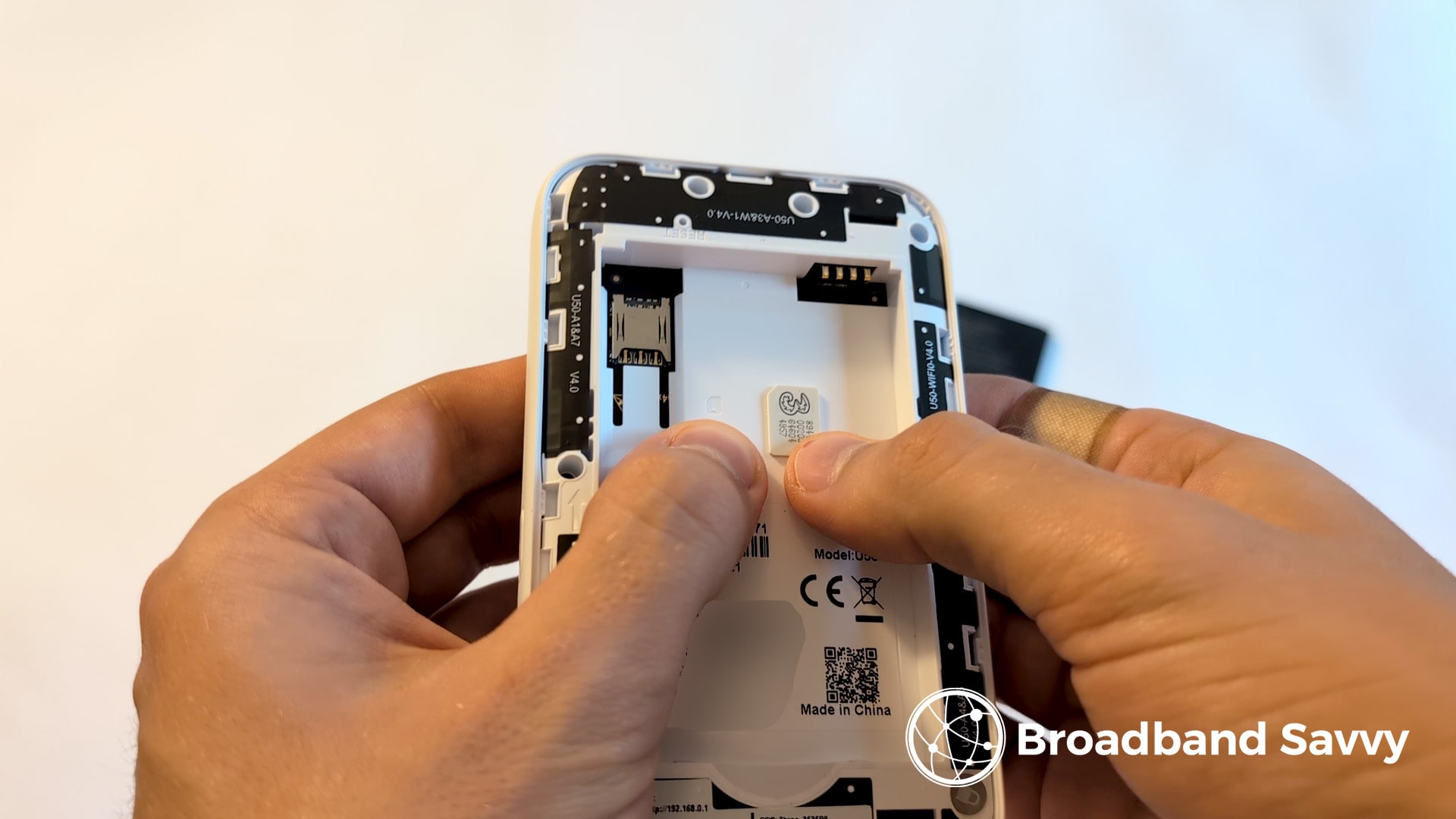 The SIM card orientation graphic on the MiFi device.