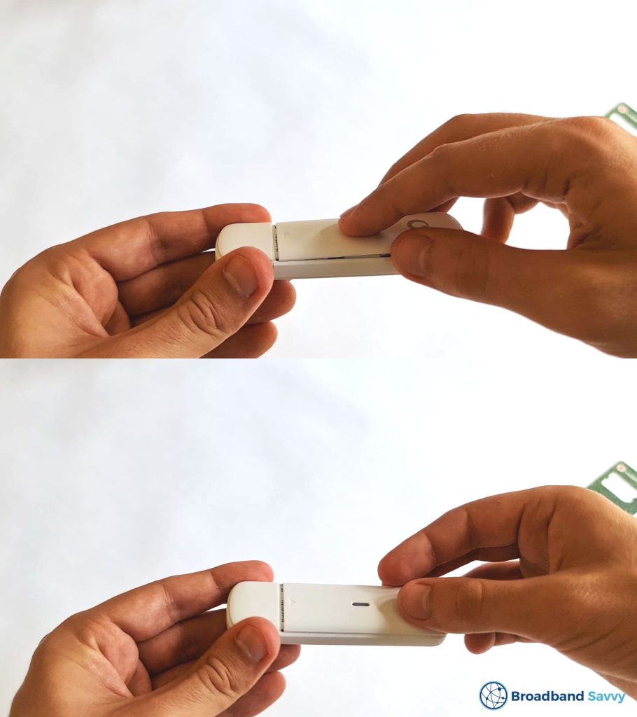 Reattaching the cover on the Vodafone K5161z dongle.