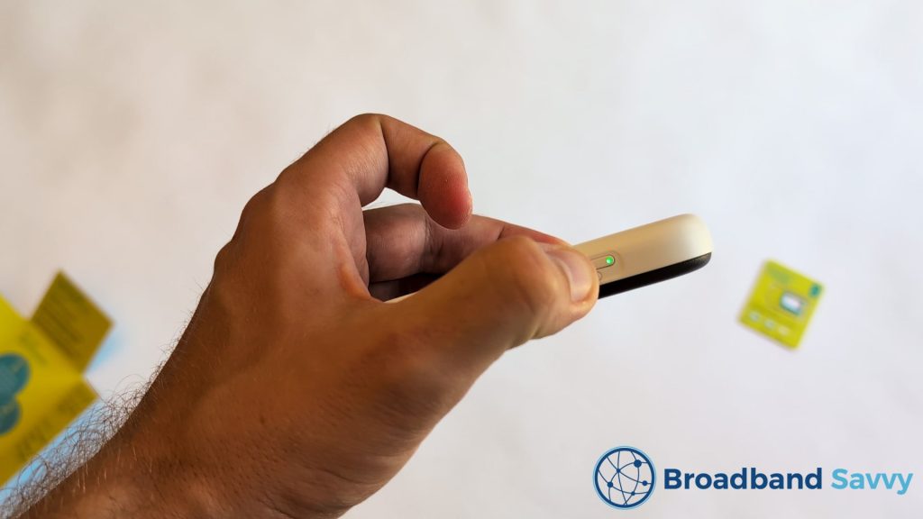 Turning on the MiFi device.